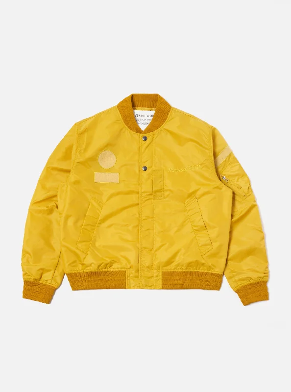 Universal Works Badge Bomber in Yellow Flight Nylon