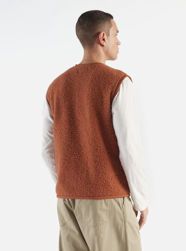 Universal Works Lancaster Gilet in Rust Alvar Fleece